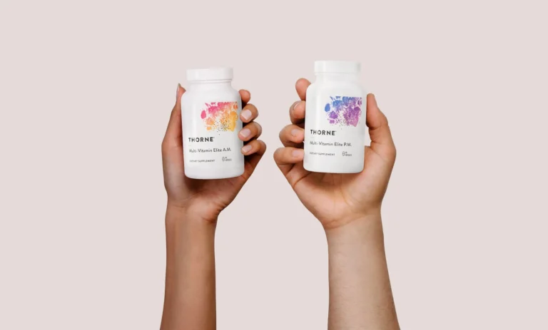 women hold supplement bottles