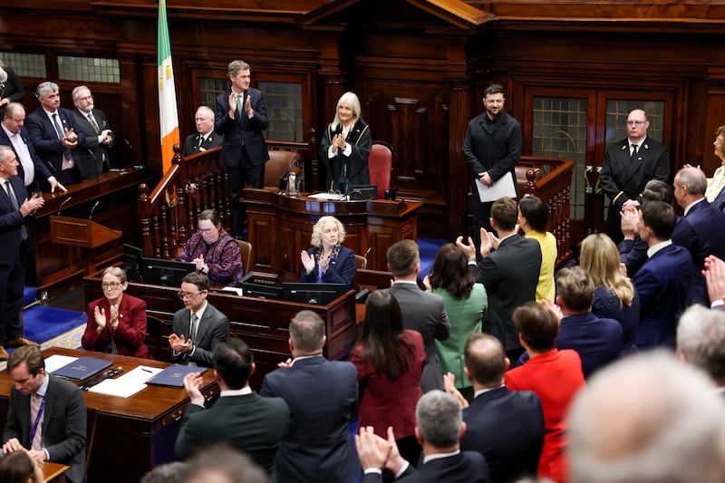 Members of the Oireachtas applaud Zelenskiy in the Dáil on Tuesday. Photograph: Tony Maxwell/Pool/AFP via Getty