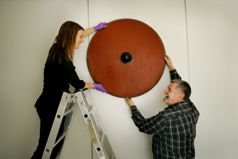 A replica of a Viking-age shield is mounted on a wall at a National Museum of Ireland exhibition. Photograph: Kate Geraghty