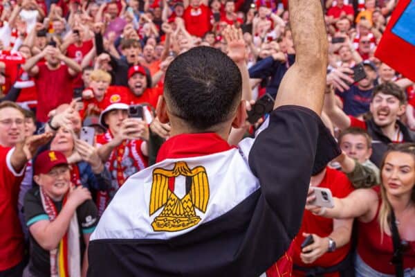 LIVERPOOL, ENGLAND - Sunday, April 27, 2025: Liverpool's Mohamed Salah, draped in a flag of Egypt, celebrates with supporters after winning the League Title after the FA Premier League match between Liverpool FC and Tottenham Hotspur FC at Anfield. Liverpool won 5-1. (Photo by David Rawcliffe/Propaganda)