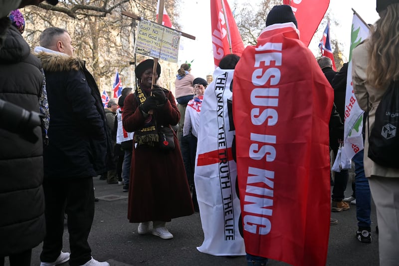 Some of those attending Saturday's Christmas carol event in Whitehall, organised by Tommy Robinson. Photograph: Justin Tallis/AFP/Getty Images