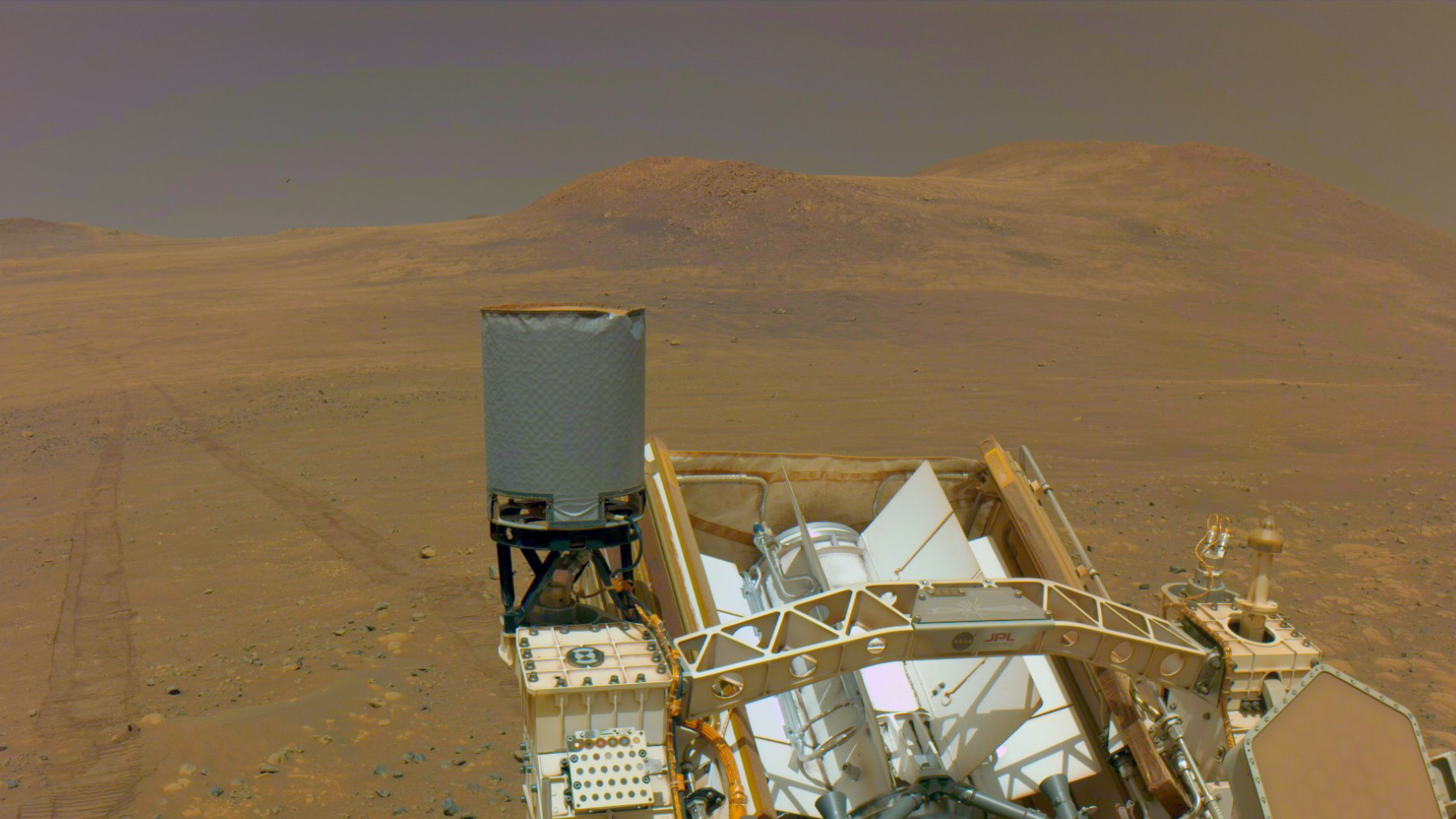 On the road to Krokodillen: One of the navigation cameras on NASA&rsquo;s Perseverance captured the rover&rsquo;s tracks coming from an area called &ldquo;Witch Hazel Hill,&rdquo; on May 13, 2025, the 1,503rd Martian day, or sol, of the mission.