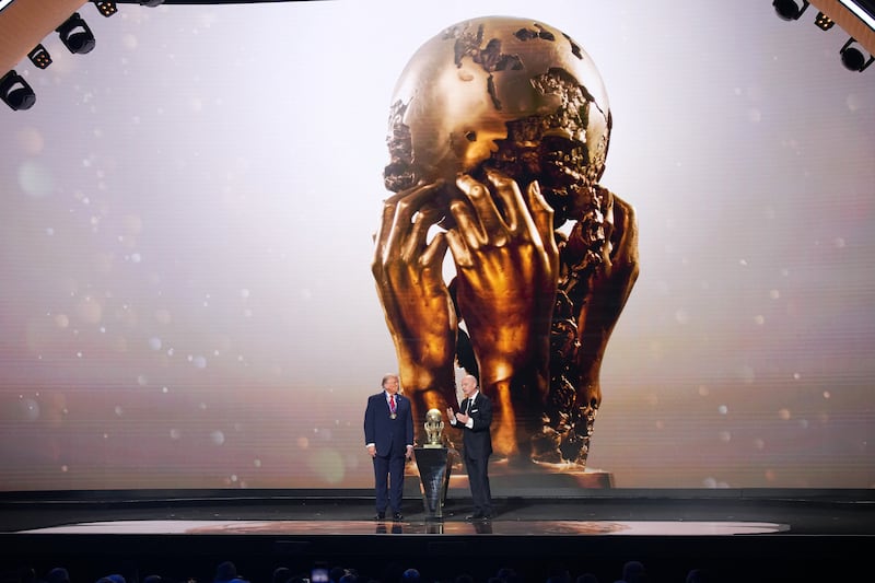 US president Donald Trump receives the Fifa Peace Prize from Fifa president Gianni Infantino at last Friday's World Cup draw in Washington. Photograph: Andrew Harnik/Getty Images