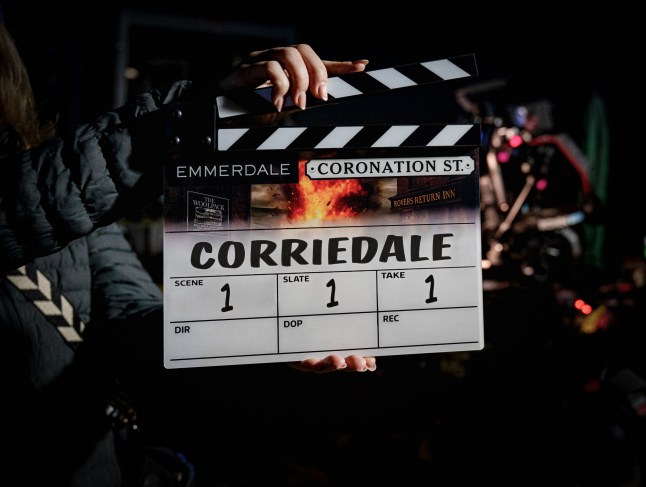 A clapper board reading Emmerdale, Coronation Street and Corriedale, to signify the ITV soaps' crossover episode.