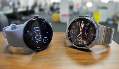 Google Pixel Watch 4 and Samsung Galaxy Watch 8 Classic placed side by side on bench top