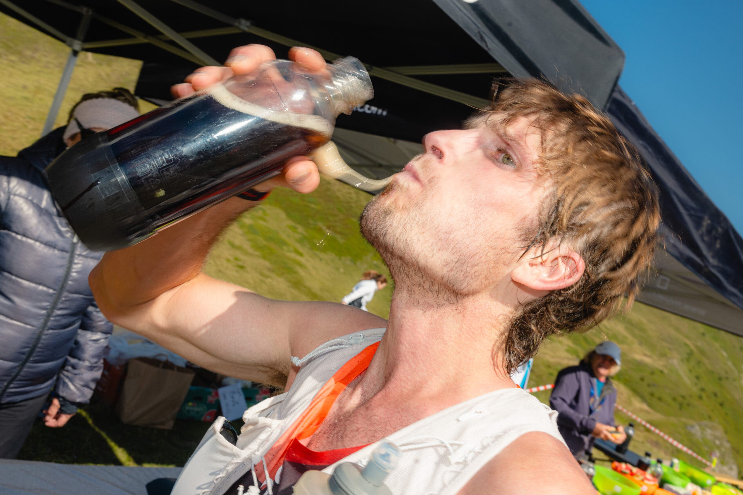 David Sinclair chugs some coke.