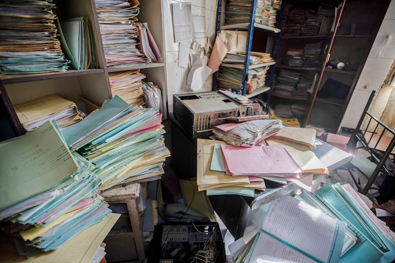Documents and files still in the infamous intelligence building in Damascus, Syria, after the fall of the Assad regime. Photograph: Osama Al Maqdoni/Middle East Images/AFP/Getty Images          