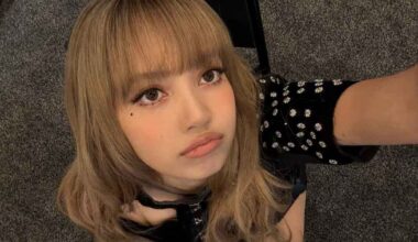 Blackpink's Lisa in Bow-Adorned Corset & Miniskirt Is Unmissable