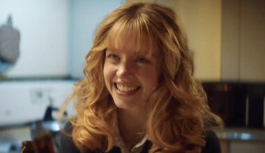 Sydney Sweeney, with big blonde hair and denim jacket, starring in Americana (2025).