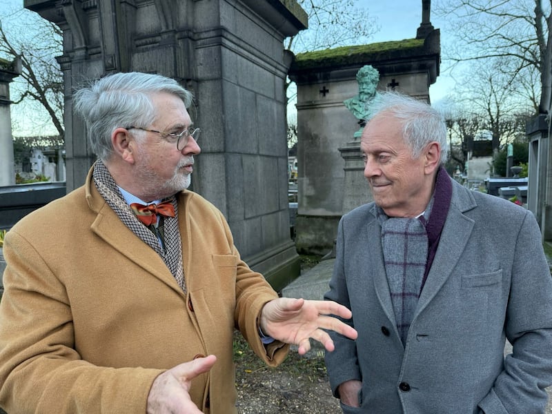 Irish ambassador to France Niall Burgess with British broadcaster and former politician Gyles Brandreth at Oscar Wilde's grave in Père Lachaise, Paris. Photograph: Bill Shipsey