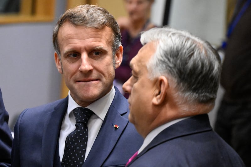 France's president Emmanuel Macron with Hungary's prime minister Viktor Orban at a round table ahead of the European Council meeting in Brussels. Photograph: John Thys/AFP/Getty 