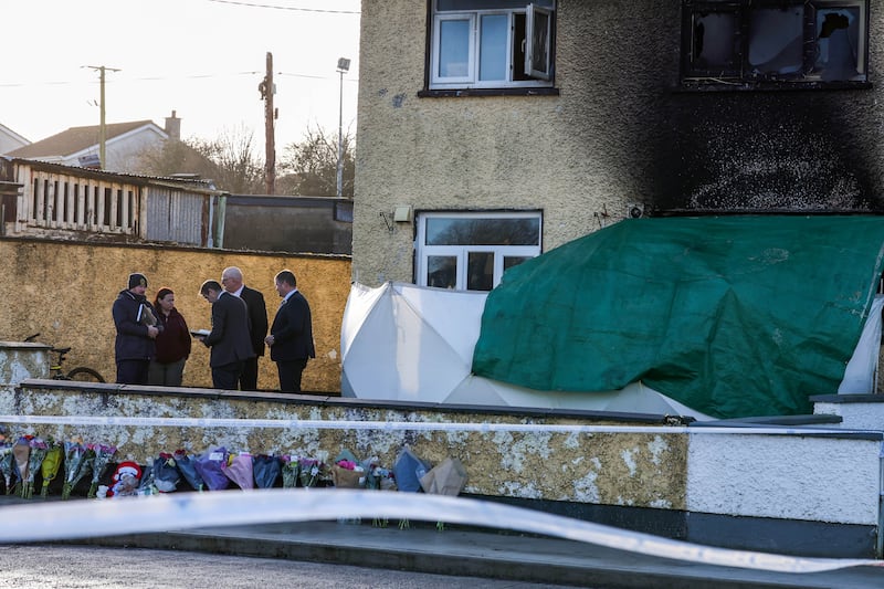 Senior garda detectives at the scene of the fire. Photograph: Colin Keegan/Collins