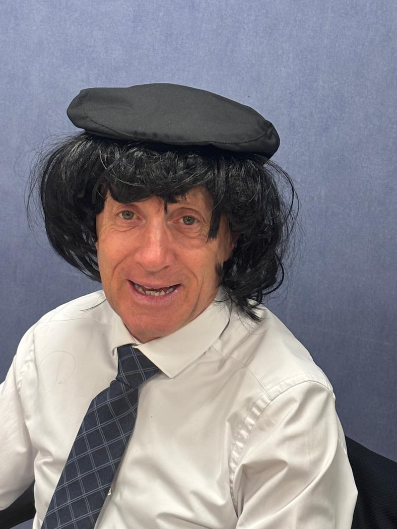 Michael Healy-Rae wearing a wig given to him by Kevin 'Boxer' Moran at the Regional Independent Group's meeting this week to show what he looked like when he had hair