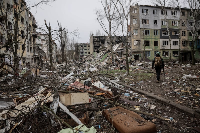 A soldier walks through the ruins of the town of Kostyantynivka in the Donetsk region of Ukraine. Photograph: Oleg Petrasiuk/Ukraine’s 24th Mechanised Brigade via AP