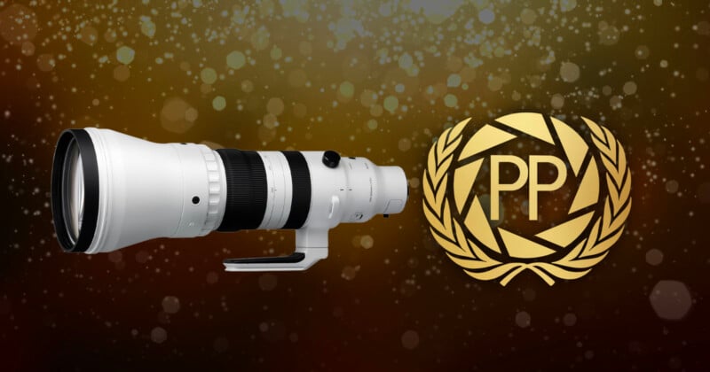 A large white telephoto camera lens is displayed next to a gold laurel wreath emblem with the letters "PP" inside, set against a sparkly brown background.