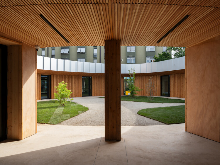 Punto Luce Socio-Educational Center / AOUMM - Image 1 of 13
