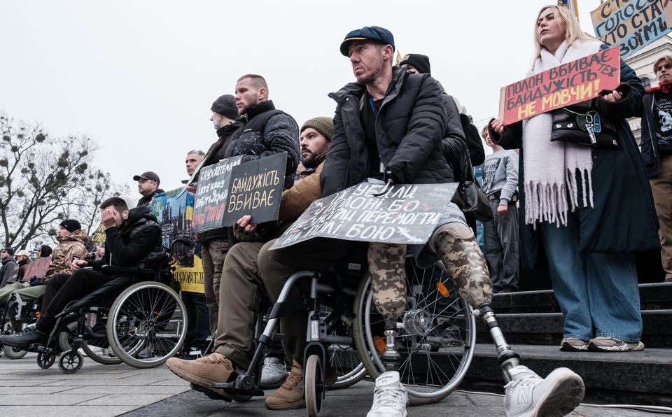Activists and relatives of Ukrainian POWs at the monument to poet Taras Shevchenko last week. Photo: Getty