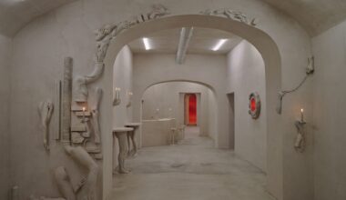 An art installation by Clementine Keith-Roach and Christopher Page that doubles as a bar, with furnishings and decor made of plaster-cast hands