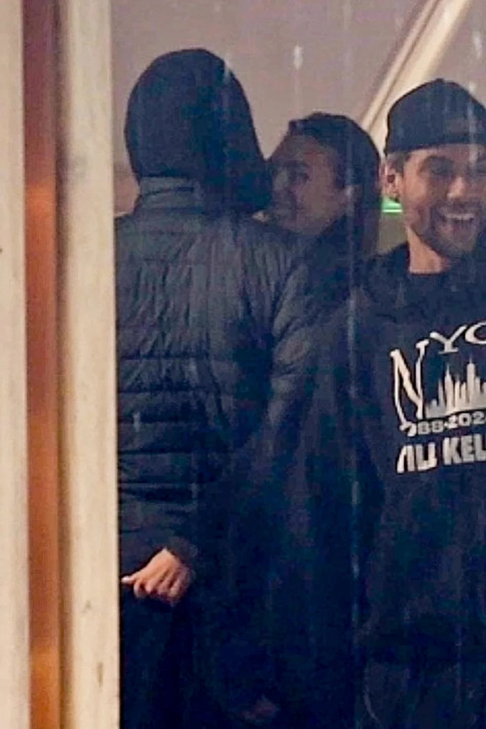 They enjoyed PDA in the Los Angeles rain. SPOT / GAMR / BACKGRID