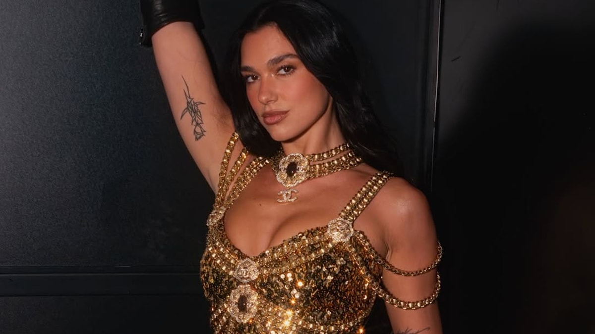 Dua Lipa dazzles in show-stopping crystal bodysuit and punk fishnets