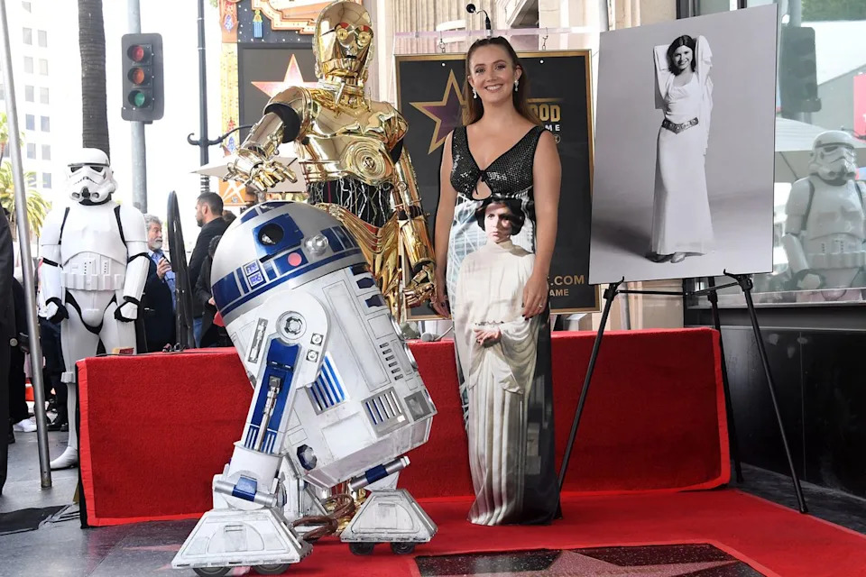 Albert L. Ortega/Getty Billie Lourd and characters from 'Star Wars' at Carrie Fisher's posthumous Hollywood Walk of Fame star ceremony in May 2023