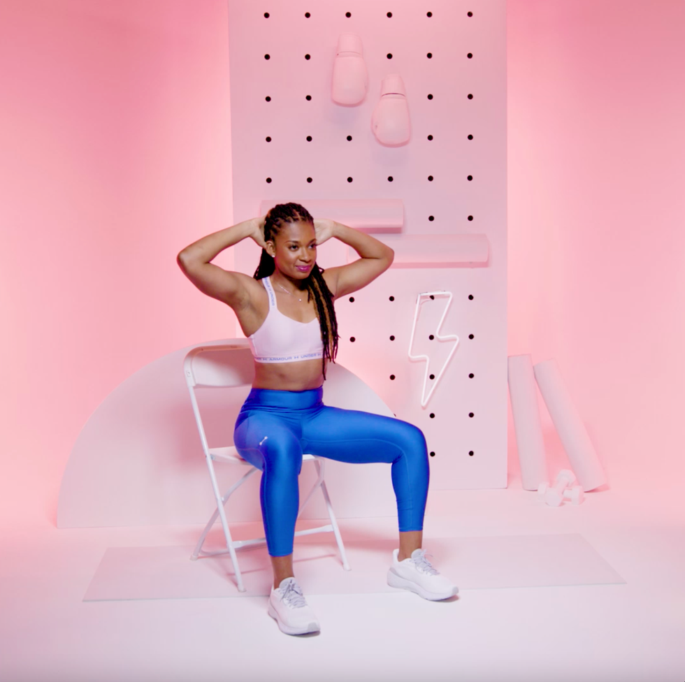 5-minute home workout 5 minute home workout: woman performing chair squat.