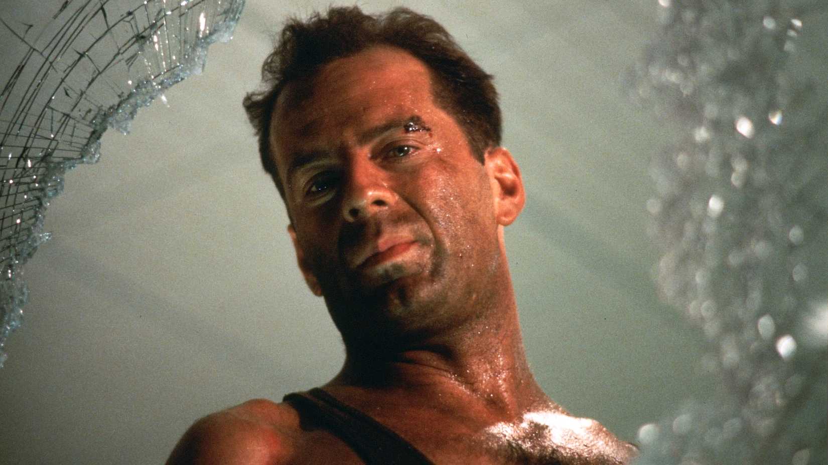 Bruce Willis as John McClane in the action classic Die Hard