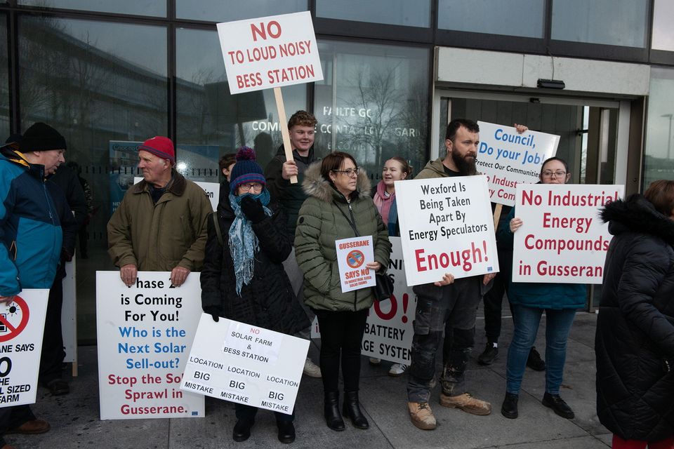 Residents from Gusserane protesting against the proposed solar development pictured outside the Wexford County Council on Monday. Pic: Jim Campbell