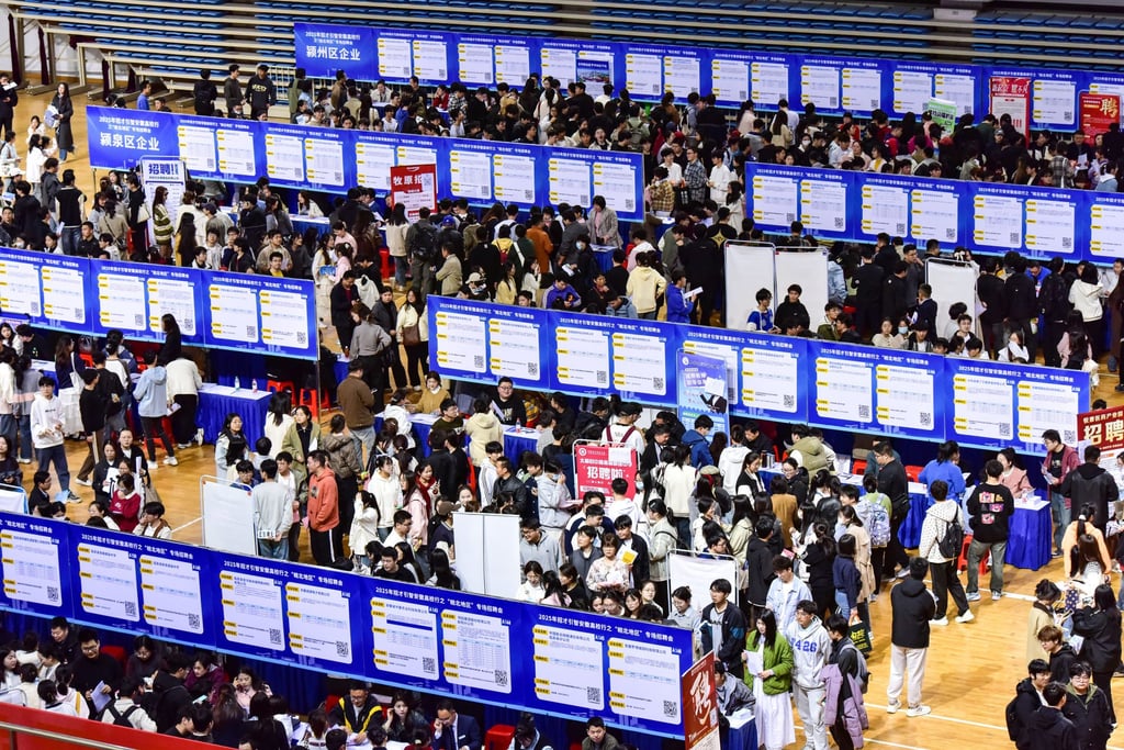 Graduates attend a job fair at Fuyang Normal University in east China’s Anhui province. Photo: CFOTO/Future Publishing via Getty Images