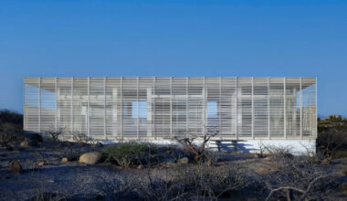 perforated facade filters daylight within casa nada in mexico