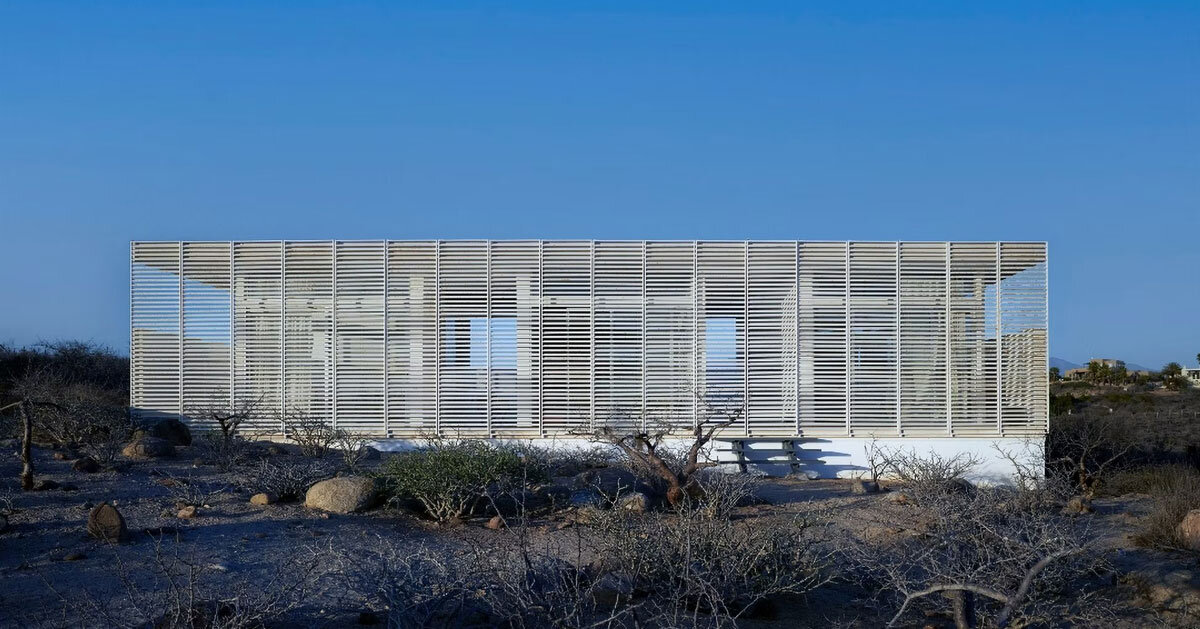 perforated facade filters daylight within casa nada in mexico