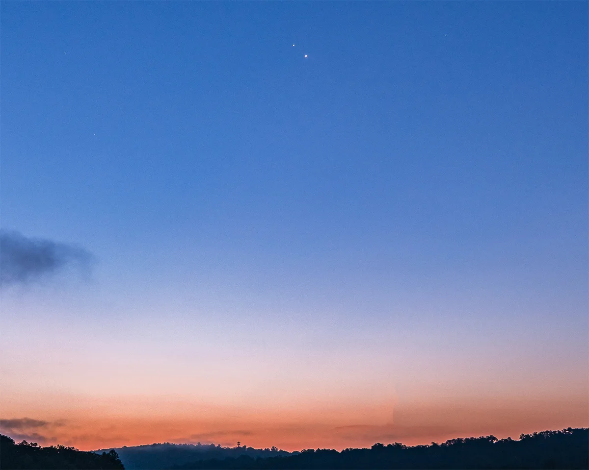 Venus and Jupiter captured by Chirag Upreti over Croton Reservoir in NY State, USA, 12 August 2025, 05:23 local time. Equipment: Sony A7R3 camera, Sony 24-70mm Sony G lens. Exposure: ISO 200, 24mm, f/5.6, 1.5sec