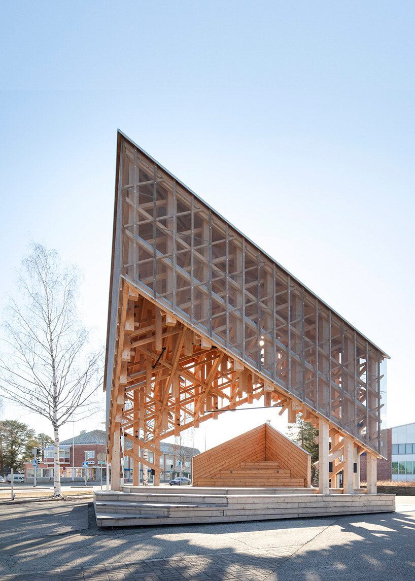 crystalline timber canopy inspired by snow fractals becomes a gathering space in finland