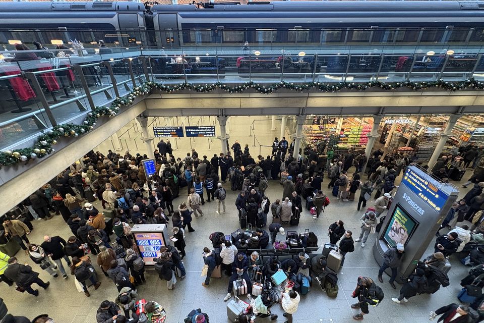 Delayed passengers at St Pancras on Tuesday (Jonathan Brady/PA)