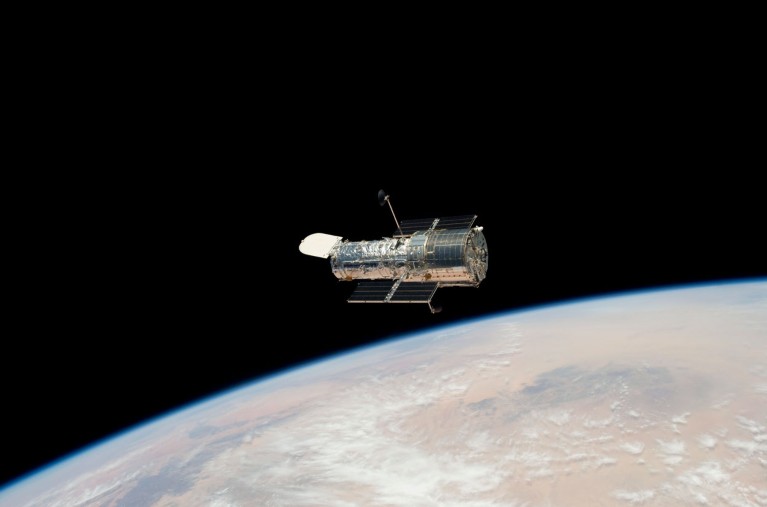 The Hubble Space Telescope in Earth's orbit photographed from space