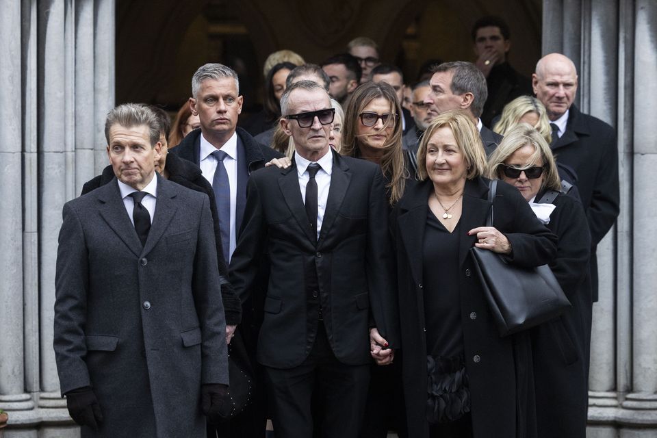 Hugh Wallace's husband, Martin Corbett, and family leaving St Patrick's Cathedral after the funeral service in Dublin. Photo: Sam Boal/Collins Photos