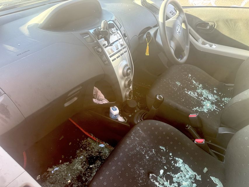 The car which had its windows smashed during the alleged attack (Photo: Collins)