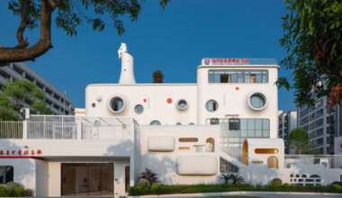 dika design shapes playful interstellar kindergarten crowned by astronaut sculpture