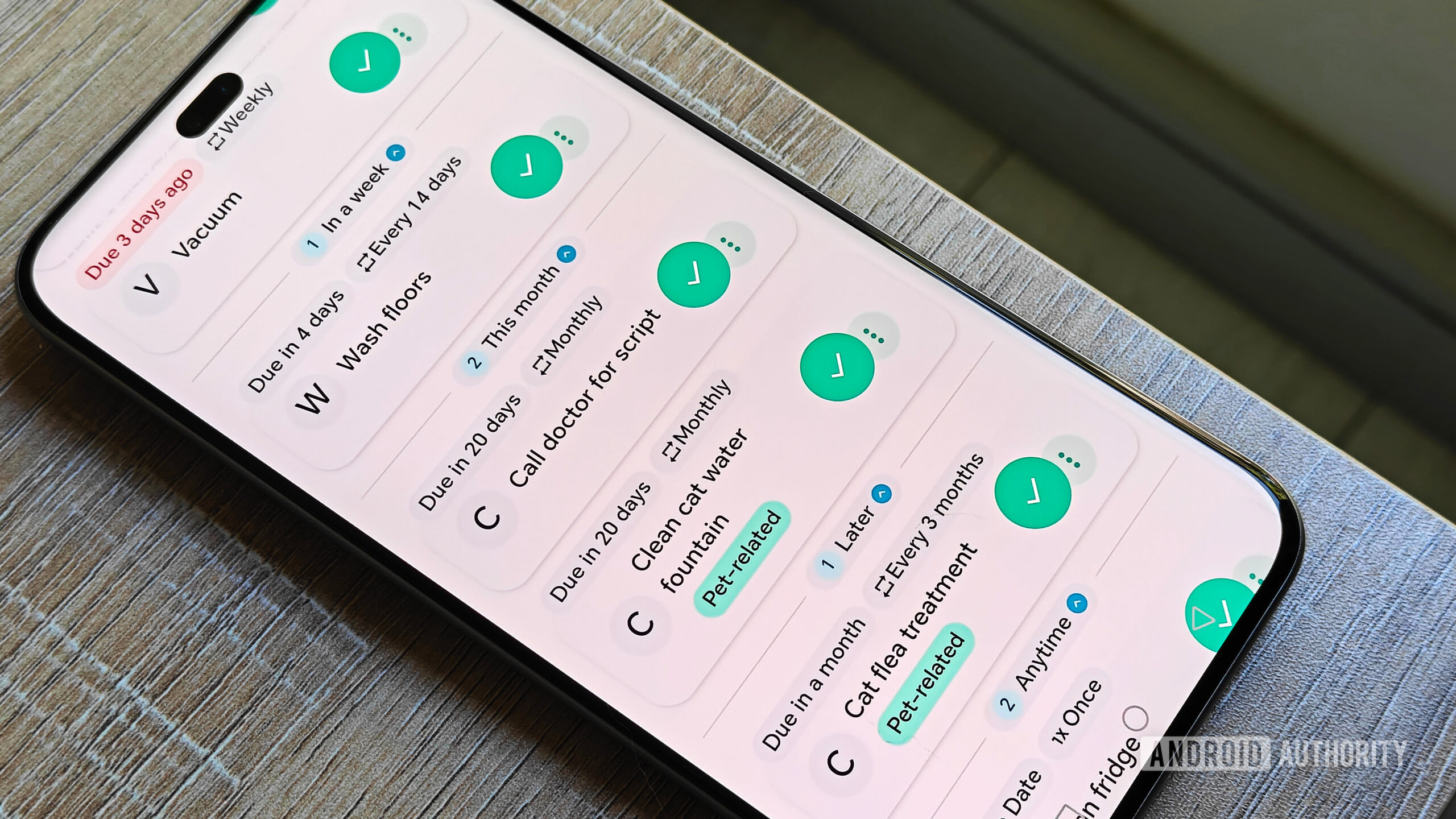 donetick chores tasks on a smartphone on a table