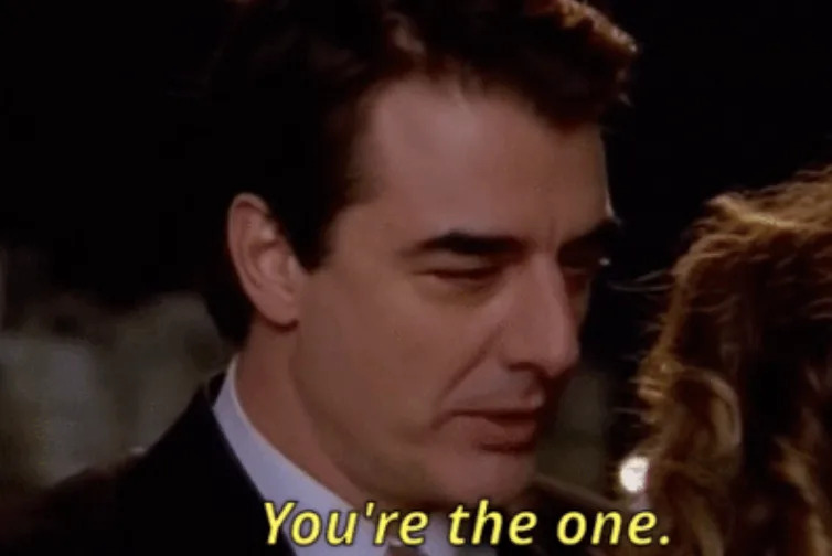 A man facing a woman with text overlay: "You're the one."