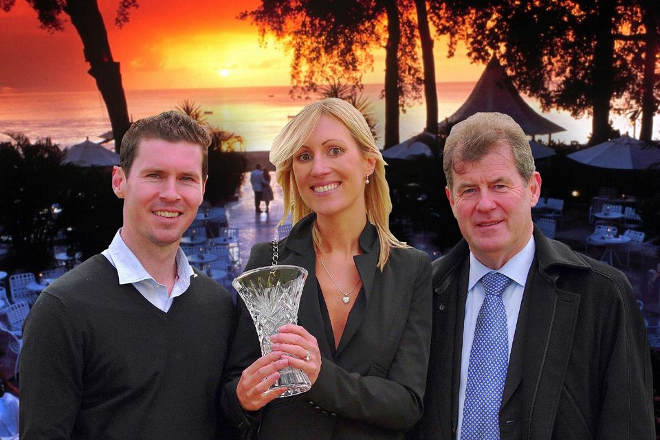 Emma McManus with her husband John and father-in-law JP in 2011 against a background of the Sandy Lane resort in Barbados. Photomontage