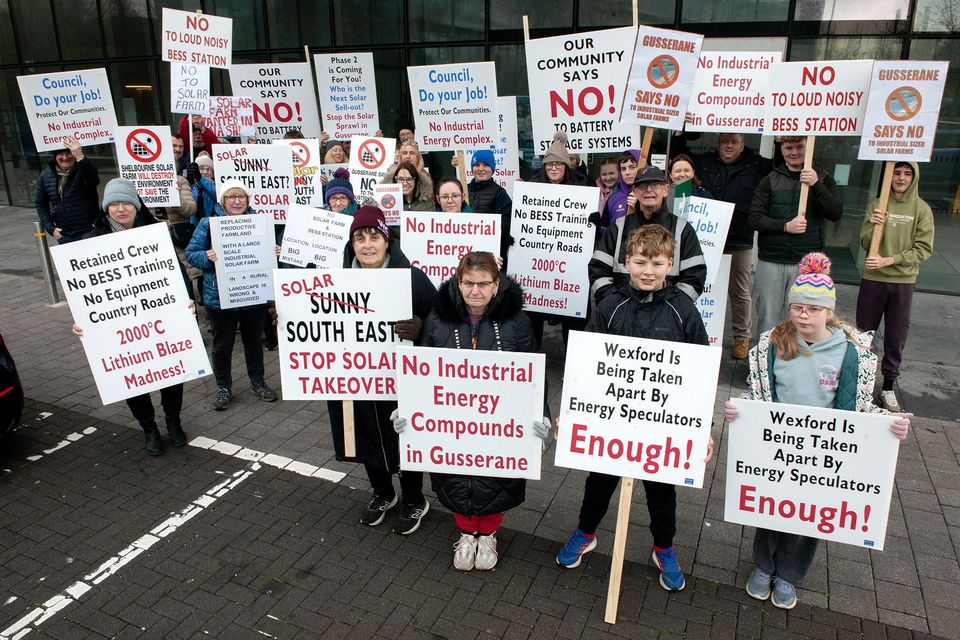 Residents from Gusserane protesting against the proposed solar development pictured outside the Wexford County Council on Monday. Pic: Jim Campbell