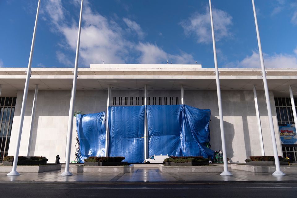 Tarps are installed in front of the sign at the Kennedy Centre. Photo: AP