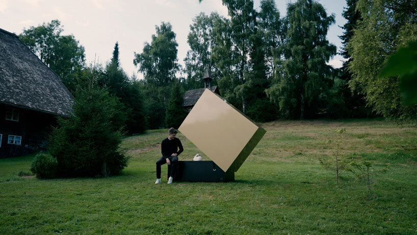 reflective gold facade wraps minimal geometric chicken coop for six fowls