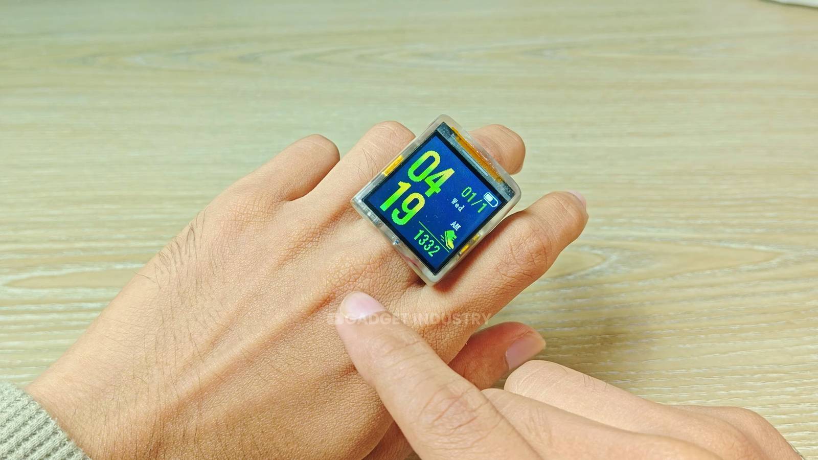 Watch an ingenious hacker turn an old smartwatch fit for the trash into a unique smart ring