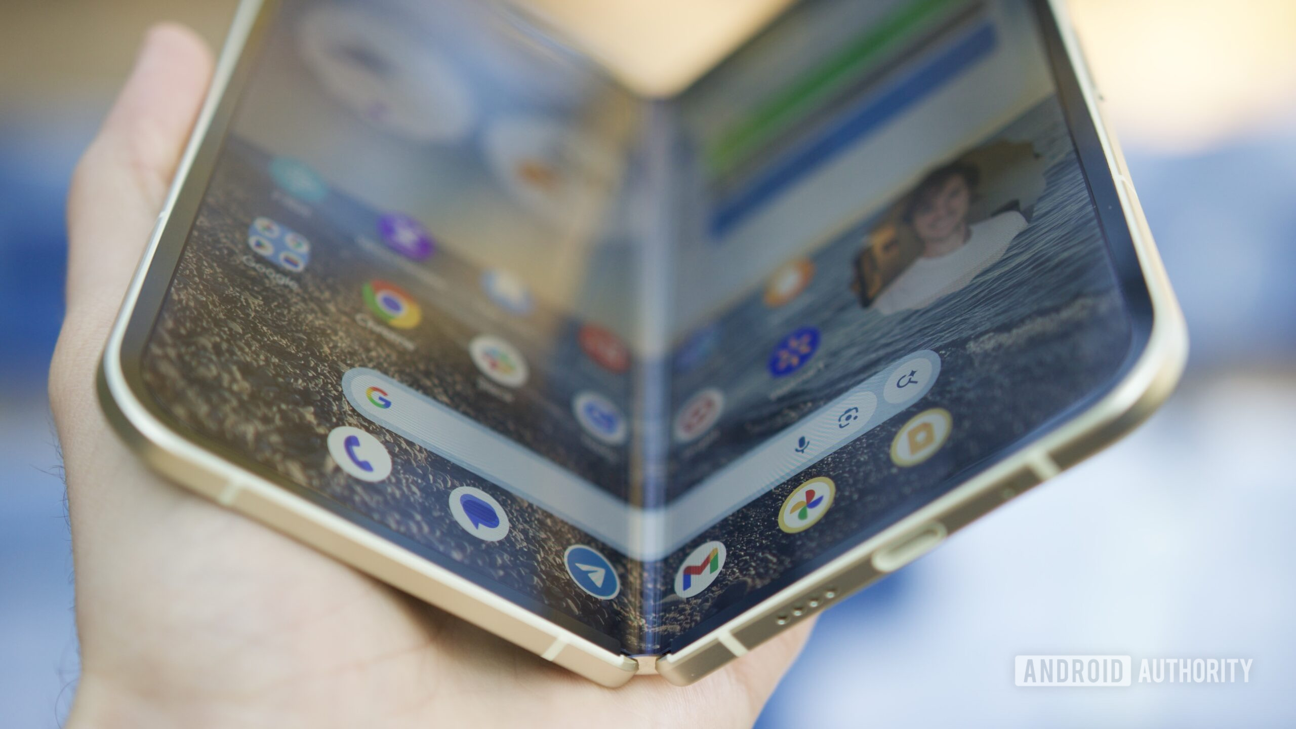 The Google Pixel 10 Pro Fold half-opened with its inner screen on.