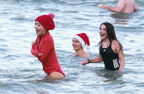 In photos: Merrymakers brave the cold for a Christmas Day dip - The Journal