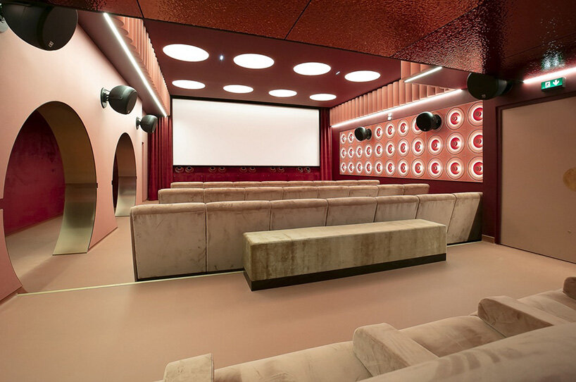historic parisian cinema is reborn in wes anderson-like pastel hues and velvet touches