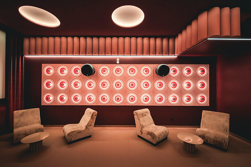 historic parisian cinema is reborn in wes anderson-like pastel hues and velvet touches
