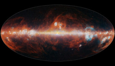 This infrared image from SPHEREx features a selection of colors emitted primarily by stars (blue, green, and white), hot hydrogen gas (blue), and cosmic dust (red). Image credit: NASA / JPL-Caltech.
